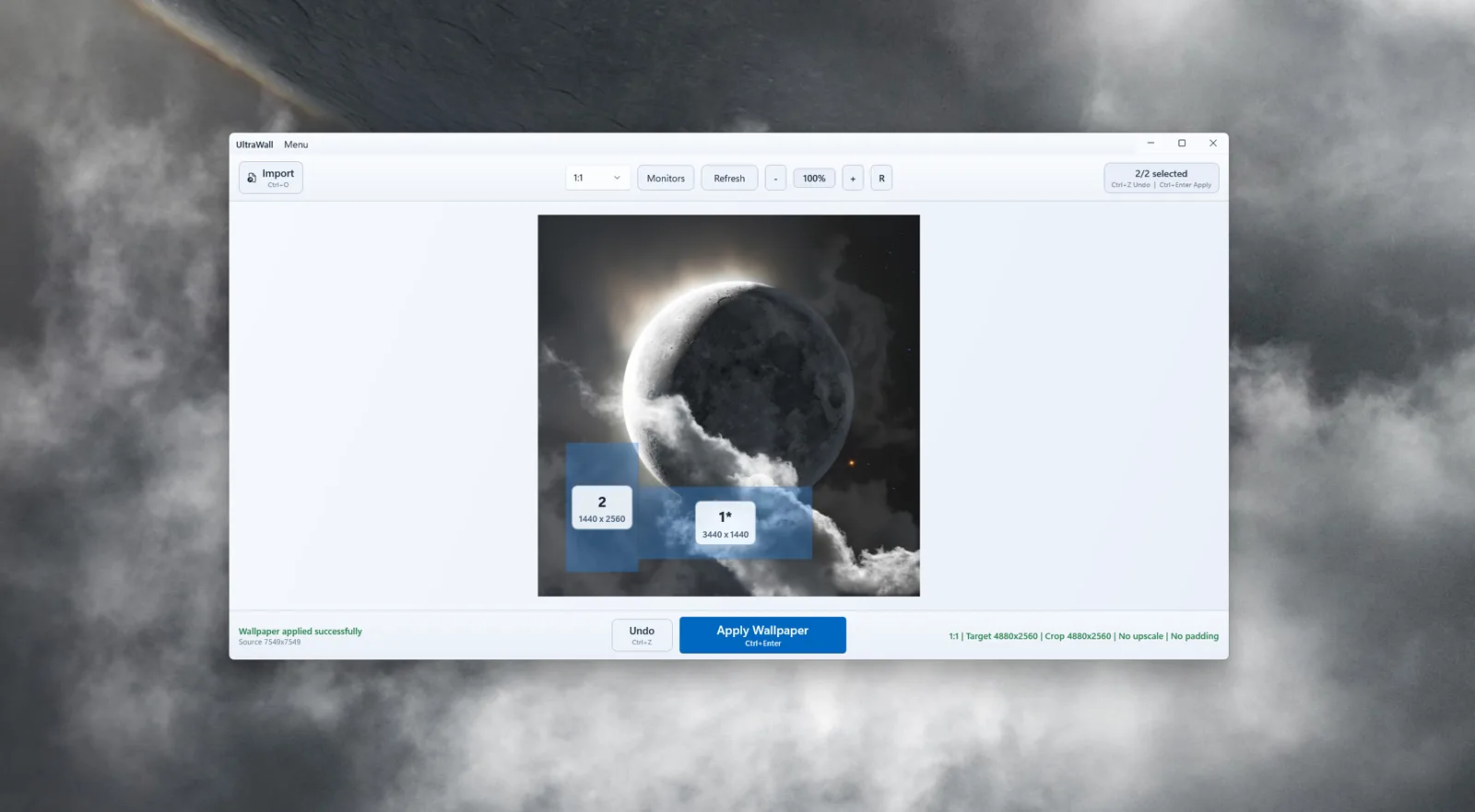 UltraWall status bar reading wallpaper applied successfully, with the moon wallpaper on the desktop